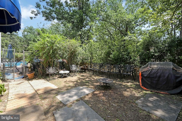 26 Worrell Rd, Tabernacle, NJ 08088 - view of yard with an outdoor pool and an outdoor fire pit