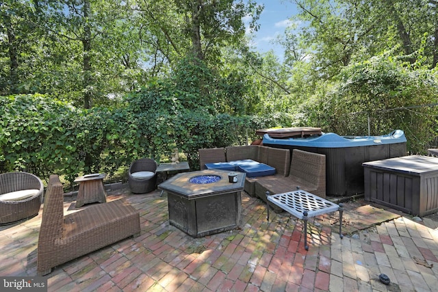26 Worrell Rd, Tabernacle, NJ 08088 - view of patio featuring a hot tub and an outdoor fire pit