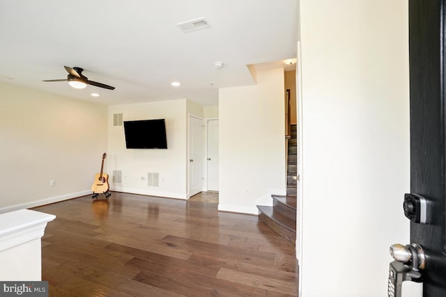 12150 Grey Squirrel St, Clarksburg, MD 20871 - unfurnished living room featuring ceiling fan, wood finished floors, stairs, and recessed lighting