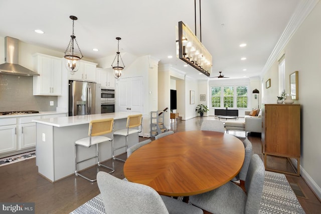 12150 Grey Squirrel St, Clarksburg, MD 20871 - dining room featuring ornamental molding, dark wood-type flooring, recessed lighting, and a ceiling fan