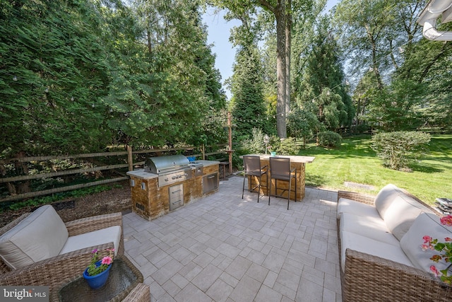 406 Devon State Rd, Devon, PA 19333 - view of patio with an outdoor hangout area, exterior kitchen, and view of wooded area