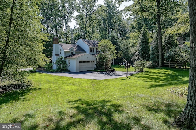 406 Devon State Rd, Devon, PA 19333 - view of green lawn with a garage