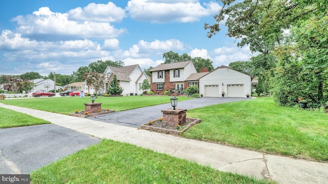 32 Lakeshore Dr, Hammonton, NJ 08037 - view of front of home with a residential view, driveway, a front lawn, an attached garage, and a chimney