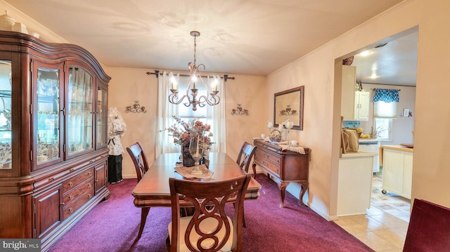 32 Lakeshore Dr, Hammonton, NJ 08037 - dining area featuring a chandelier, plenty of natural light, light colored carpet, crown molding, and light tile patterned floors