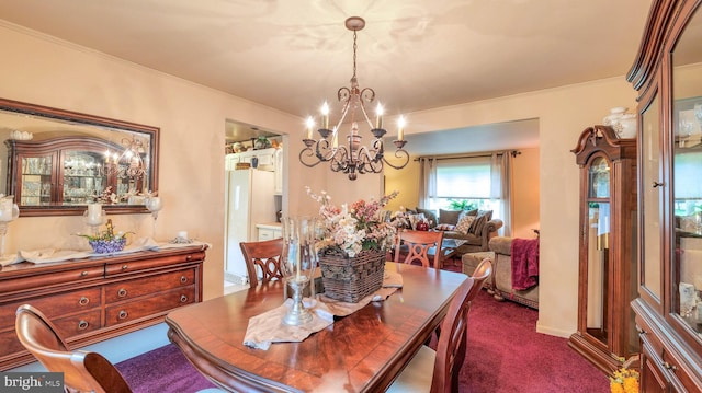 32 Lakeshore Dr, Hammonton, NJ 08037 - dining space featuring a chandelier, crown molding, and dark carpet