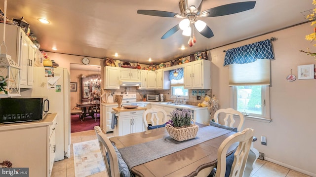 32 Lakeshore Dr, Hammonton, NJ 08037 - dining area with light tile patterned floors, a ceiling fan, and recessed lighting