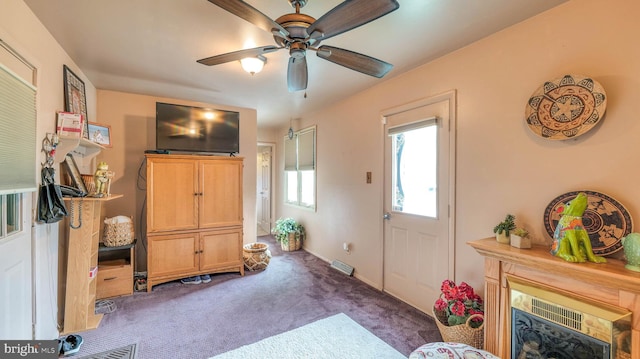 32 Lakeshore Dr, Hammonton, NJ 08037 - carpeted foyer with ceiling fan and a tile fireplace