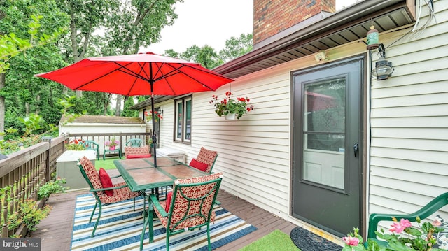 32 Lakeshore Dr, Hammonton, NJ 08037 - wooden terrace with outdoor dining area and a shed