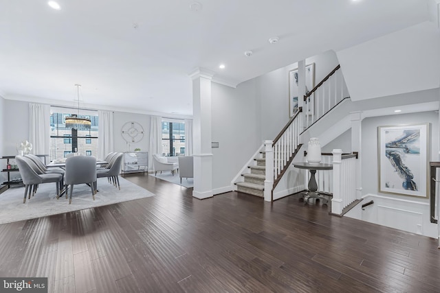43561 Michigan Sq, Leesburg, VA 20176 - dining area featuring wood finished floors, stairway, recessed lighting, and a chandelier