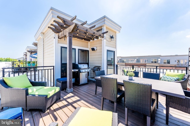 43561 Michigan Sq, Leesburg, VA 20176 - wooden deck featuring outdoor dining space, an outdoor hangout area, and a grill