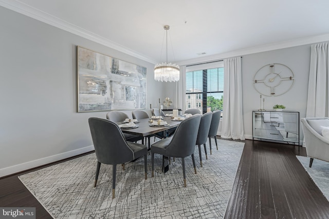 43561 Michigan Sq, Leesburg, VA 20176 - dining space featuring a chandelier, ornamental molding, and wood finished floors