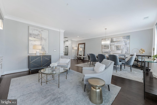 43561 Michigan Sq, Leesburg, VA 20176 - living room with dark wood-style flooring and ornamental molding