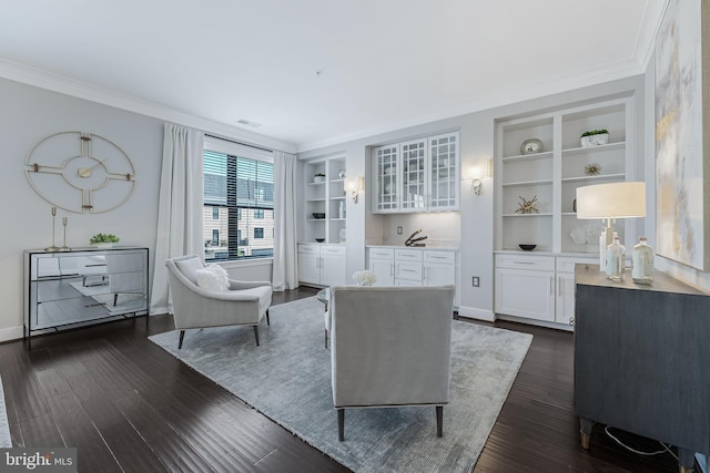 43561 Michigan Sq, Leesburg, VA 20176 - living area featuring ornamental molding, built in shelves, and dark wood finished floors