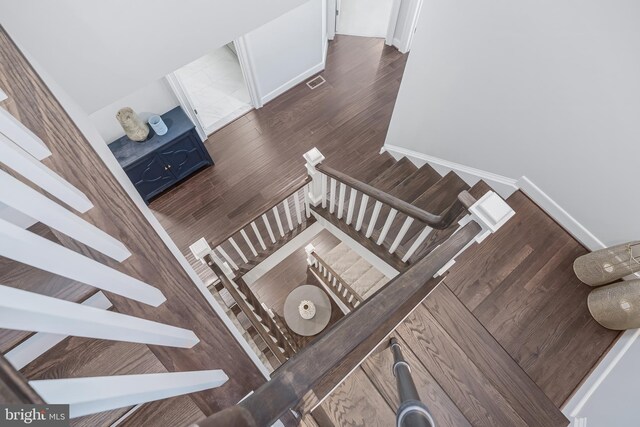 43561 Michigan Sq, Leesburg, VA 20176 - stairway with wood finished floors and baseboards