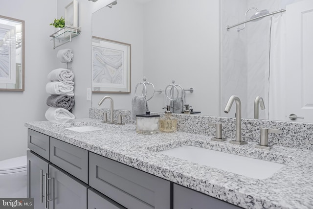43561 Michigan Sq, Leesburg, VA 20176 - bathroom featuring double vanity and a shower with curtain