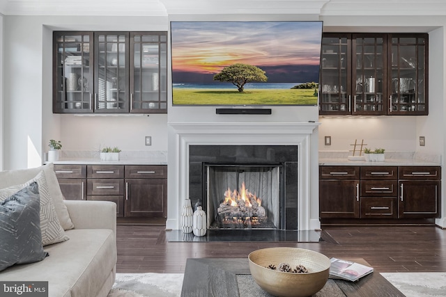 43561 Michigan Sq, Leesburg, VA 20176 - living room featuring dark wood finished floors and a fireplace with flush hearth