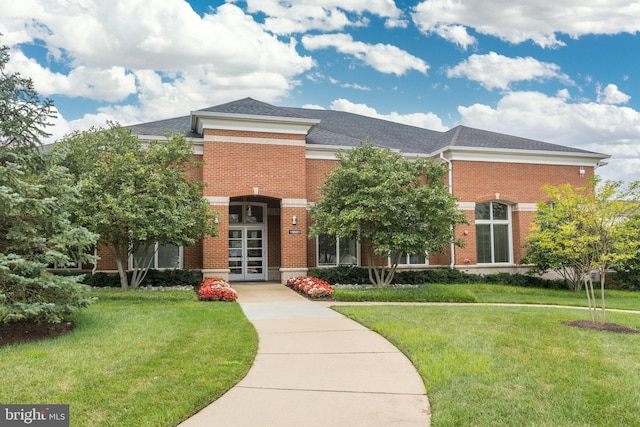 43561 Michigan Sq, Leesburg, VA 20176 - view of front of home featuring brick siding and a front lawn