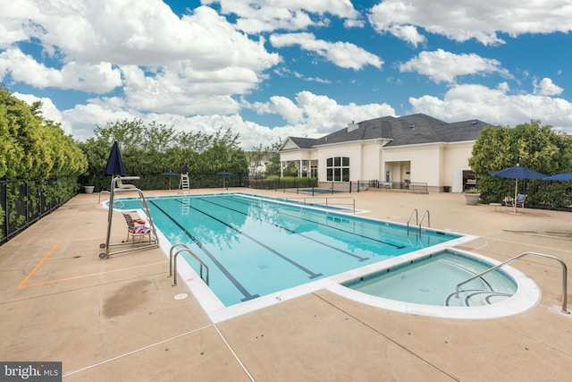 43561 Michigan Sq, Leesburg, VA 20176 - community pool featuring a patio