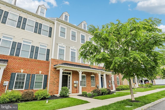 221 Patriots Path, Malvern, PA 19355 - view of property featuring brick siding and a front lawn