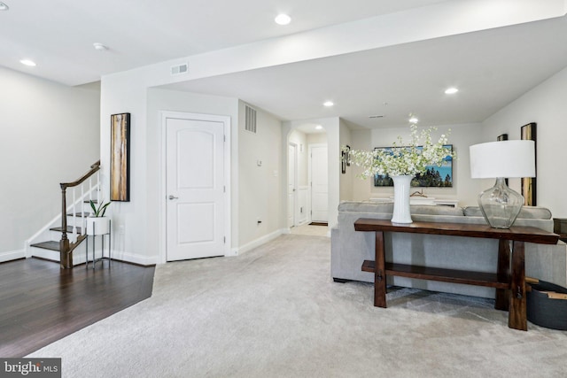 221 Patriots Path, Malvern, PA 19355 - carpeted living area with arched walkways, stairs, and recessed lighting