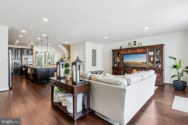 221 Patriots Path, Malvern, PA 19355 - living area with recessed lighting, dark wood finished floors, and stairway