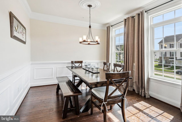 221 Patriots Path, Malvern, PA 19355 - dining area with a chandelier, crown molding, dark wood-style flooring, and a wainscoted wall