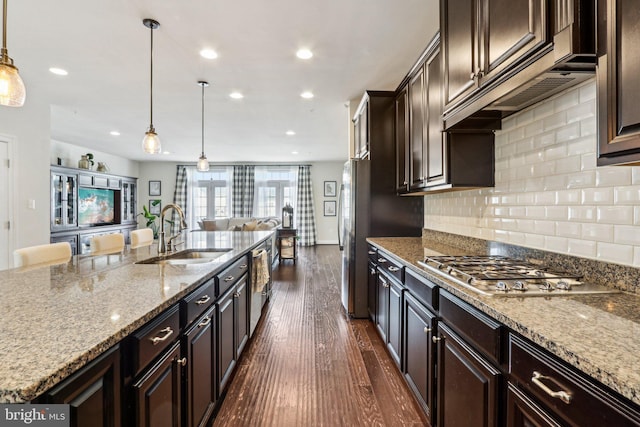 221 Patriots Path, Malvern, PA 19355 - kitchen featuring stainless steel appliances, open floor plan, recessed lighting, dark brown cabinetry, and dark wood-type flooring