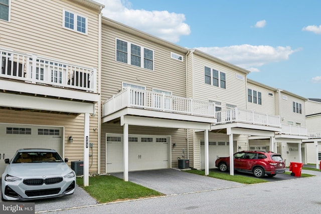 221 Patriots Path, Malvern, PA 19355 - view of front facade featuring an attached garage, driveway, and a balcony