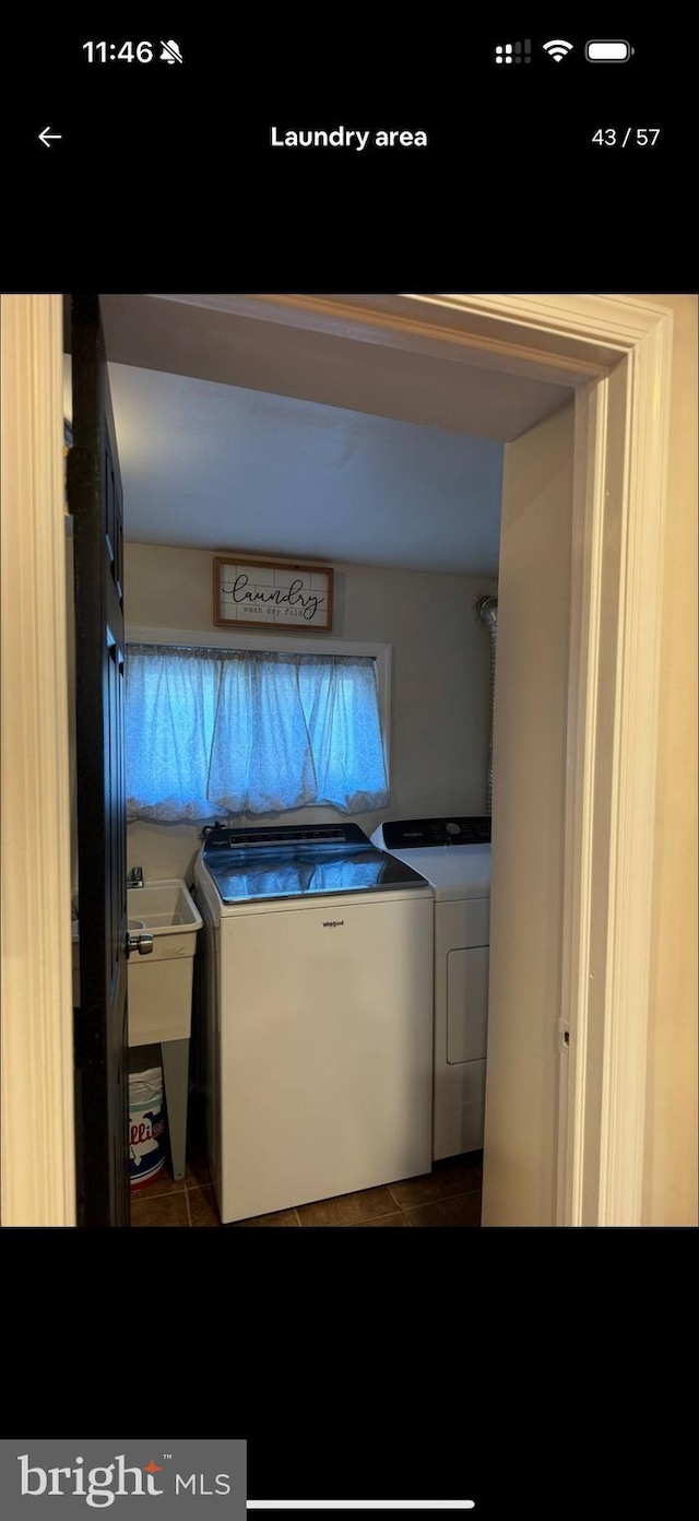 2442 S Philip St, Philadelphia, PA 19148 - washroom featuring independent washer and dryer and tile patterned flooring