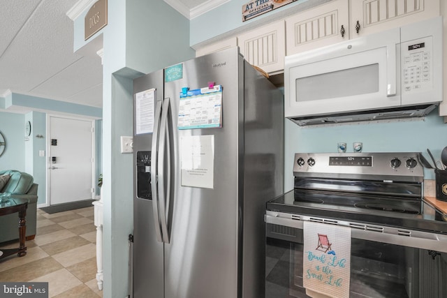 427 14th St Unit 10203, Ocean City, MD 21842 - kitchen with stainless steel appliances, crown molding, and light floors