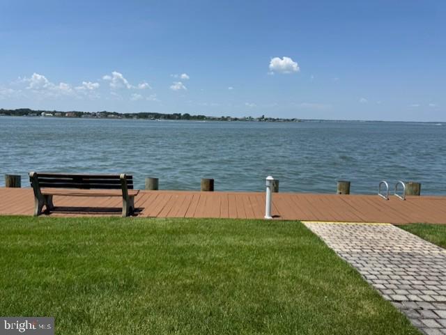 427 14th St Unit 10203, Ocean City, MD 21842 - dock featuring a water view and a lawn