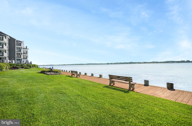 427 14th St Unit 10203, Ocean City, MD 21842 - dock area featuring a lawn and a water view