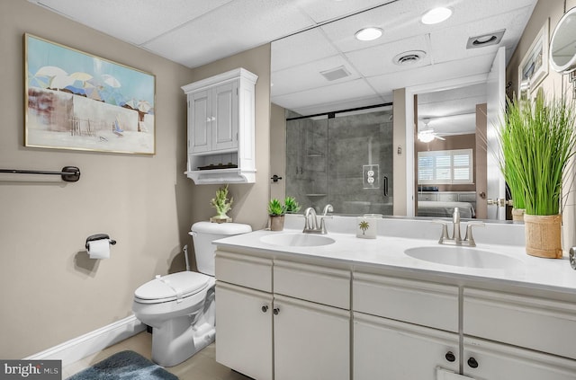 427 14th St Unit 10203, Ocean City, MD 21842 - full bath with double vanity, a shower stall, ensuite bathroom, tile patterned flooring, and a ceiling fan