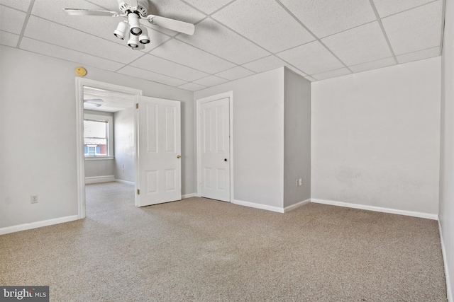 128 E Main St, Palmyra, PA 17078 - spare room featuring carpet floors, a paneled ceiling, and ceiling fan