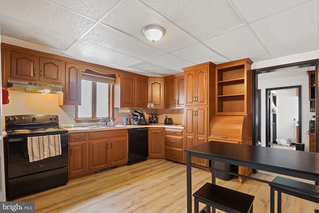 128 E Main St, Palmyra, PA 17078 - kitchen with black appliances, under cabinet range hood, a drop ceiling, light wood-type flooring, and open shelves