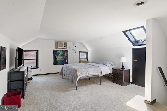 128 E Main St, Palmyra, PA 17078 - bedroom featuring lofted ceiling, carpet flooring, a skylight, an AC wall unit, and multiple windows