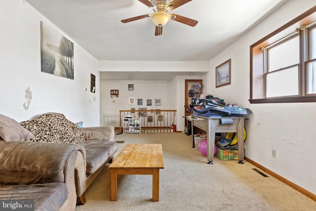 128 E Main St, Palmyra, PA 17078 - carpeted living area with ceiling fan and baseboards