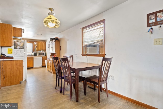 128 E Main St, Palmyra, PA 17078 - dining area featuring healthy amount of natural light, light wood-style floors, and cooling unit