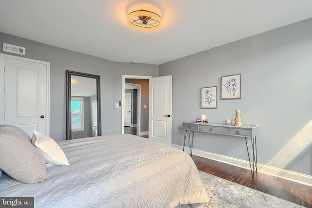 4316 Shamrock Ave, Baltimore, MD 21206 - bedroom with dark wood-style floors and baseboards