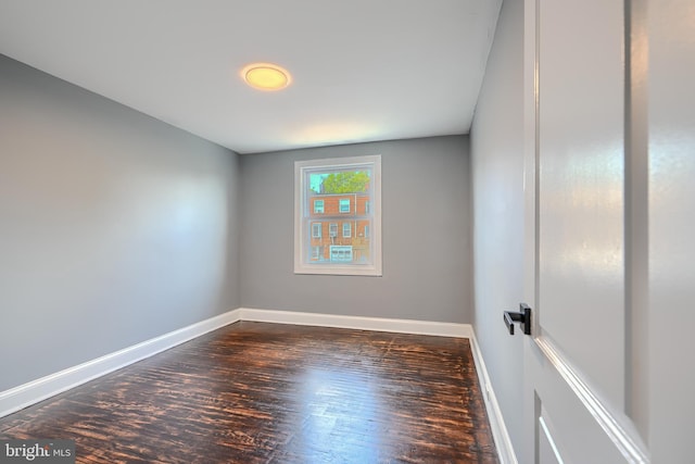4316 Shamrock Ave, Baltimore, MD 21206 - spare room with baseboards and dark wood finished floors