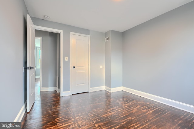 4316 Shamrock Ave, Baltimore, MD 21206 - empty room with wood finished floors and a smoke detector