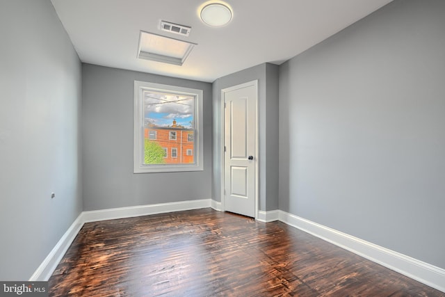 4316 Shamrock Ave, Baltimore, MD 21206 - unfurnished room with dark wood-style floors and baseboards