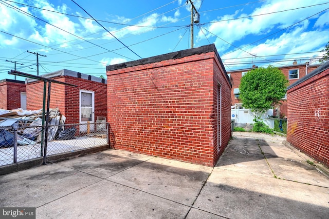 4316 Shamrock Ave, Baltimore, MD 21206 - view of home's exterior with brick siding and a patio area
