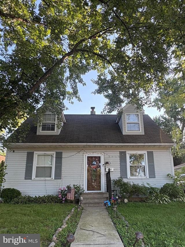 128 W Martin Ln, Norwood, PA 19074 - new england style home featuring a front lawn