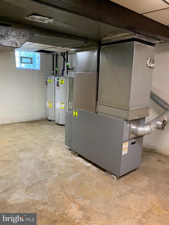 70 Hargrave Ln, Media, PA 19063 - below grade area with gas water heater, heating unit, and electric water heater