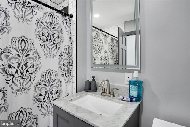 553 Wunder St Fl 1St, Reading, PA 19602 - bathroom featuring vanity and a shower with shower curtain