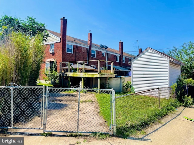 1902 Kelmore Rd, Baltimore, MD 21222 - rear view of house featuring a gate