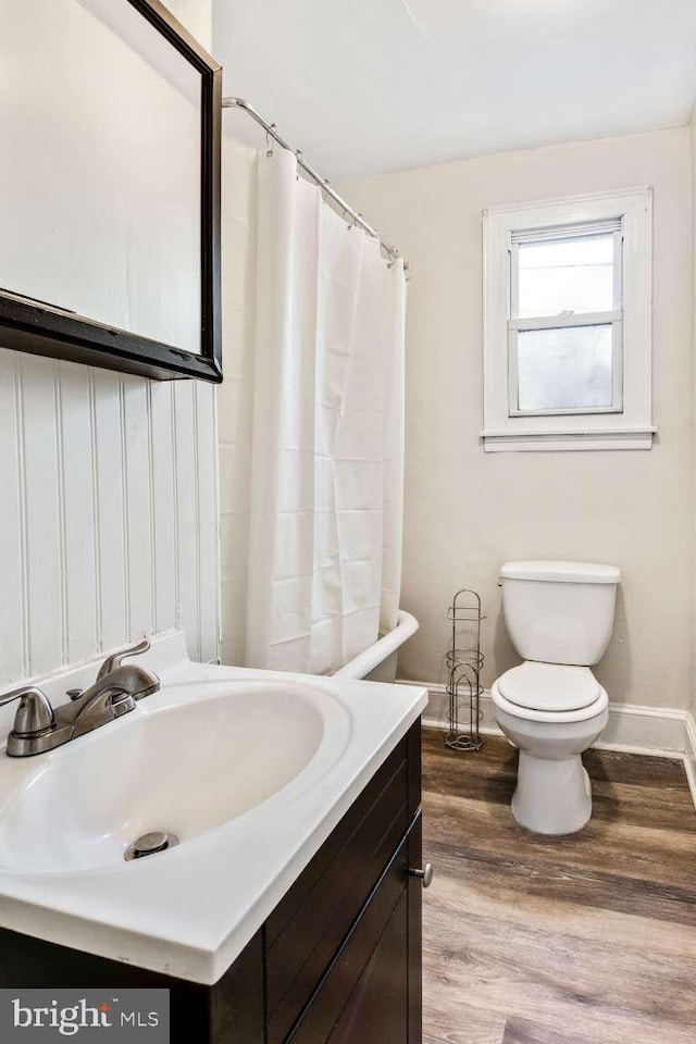 3339 N 21st St, Philadelphia, PA 19140 - bathroom featuring vanity, wood finished floors, and a shower with shower curtain