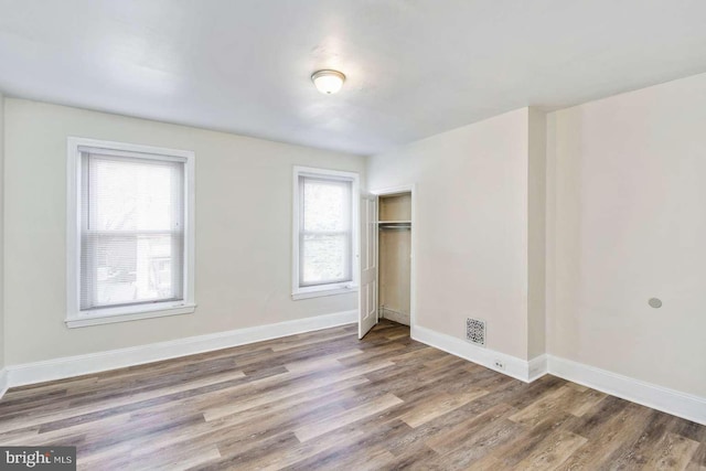 3339 N 21st St, Philadelphia, PA 19140 - unfurnished bedroom featuring wood finished floors and a closet