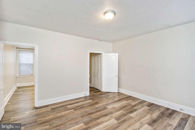 3339 N 21st St, Philadelphia, PA 19140 - empty room with wood finished floors